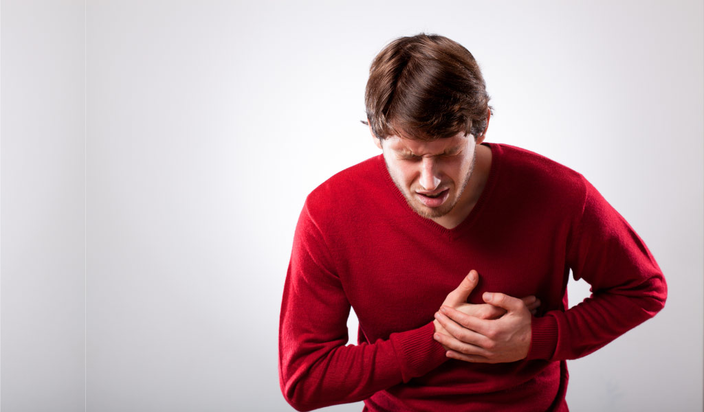 Chest pain is one of the symptoms of heart blockage